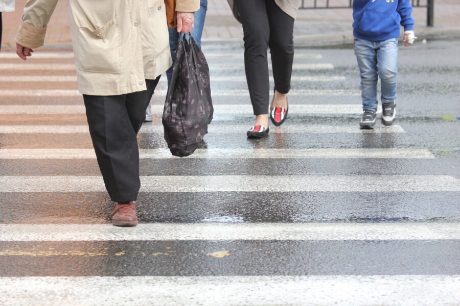 People crossing crosswalk